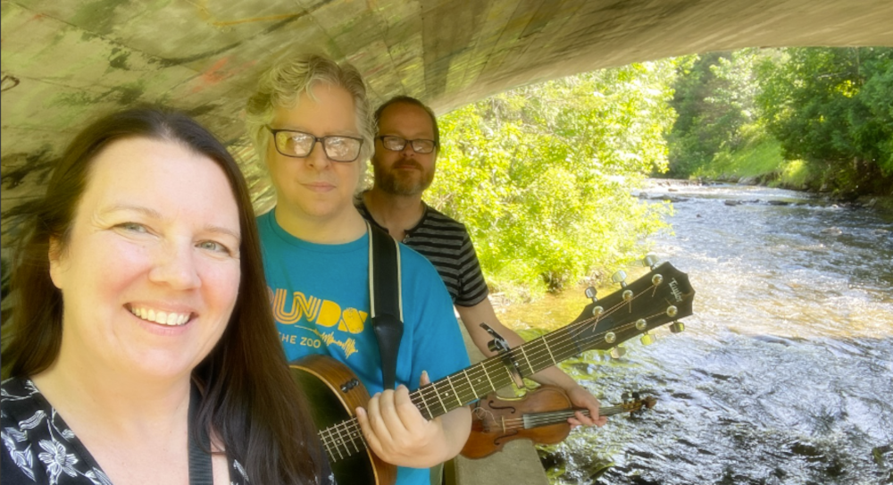 Kate Hinote Trio performing under the bridge