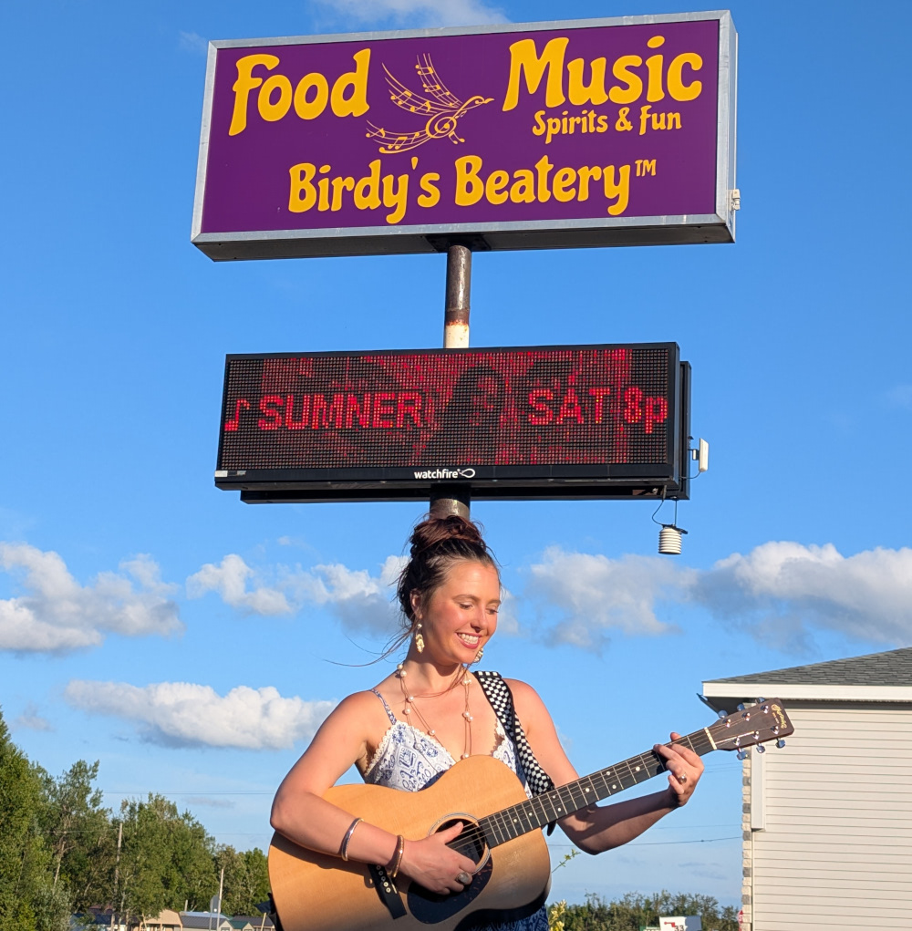Sumner performing at Birdy's Beatery