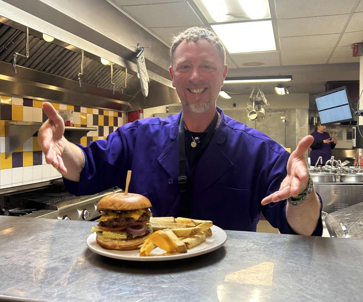 TJ Serving a Burger